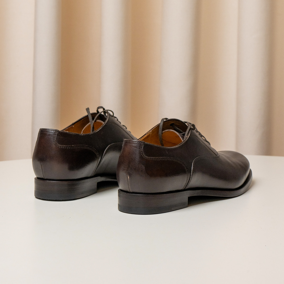 Consiglieri: heel and dark sole of the brown Oxford shoes