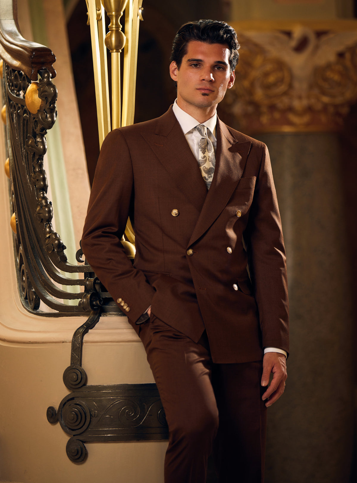 Dark brown double-breasted Consiglieri suit with a patterned tie