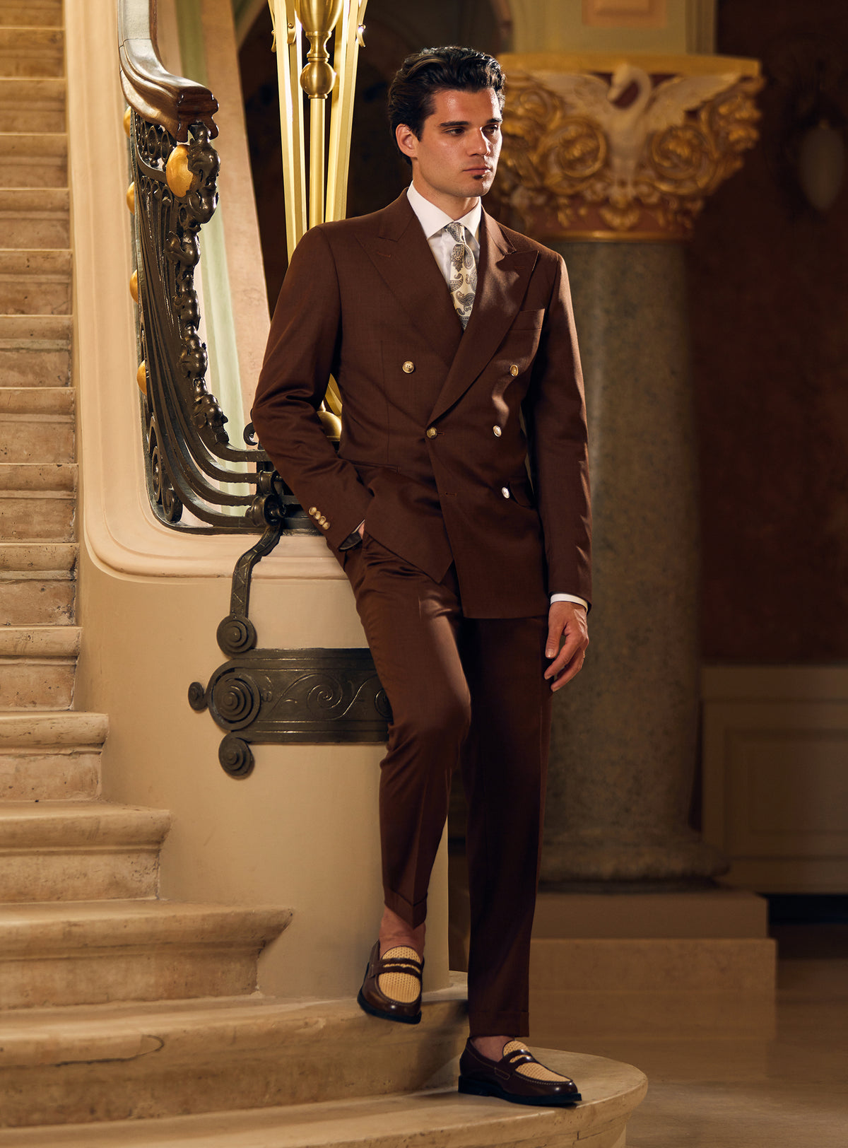 Dark brown double-breasted Consiglieri suit with a patterned tie