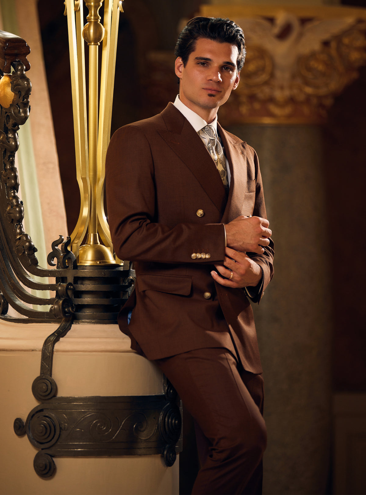Dark brown double-breasted Consiglieri suit with a patterned tie