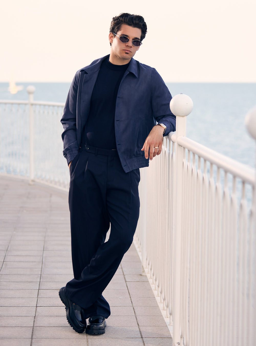 Navy Consiglieri jacket with a shirt collar, styled with a dark T-shirt and trousers