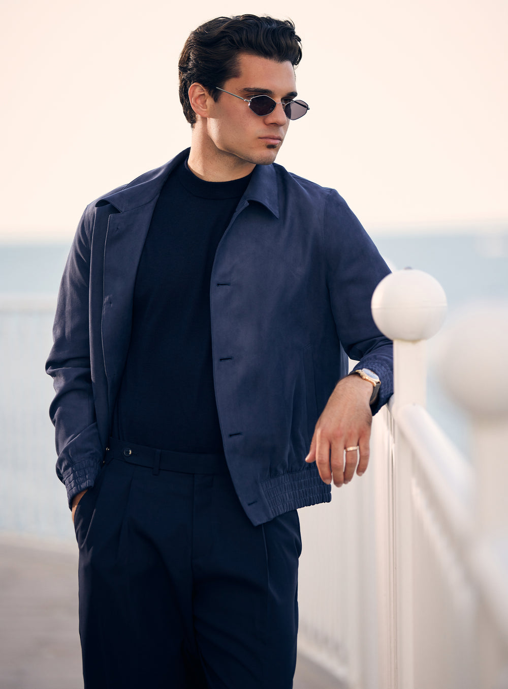Navy Consiglieri jacket with a shirt collar, styled with a dark T-shirt and trousers