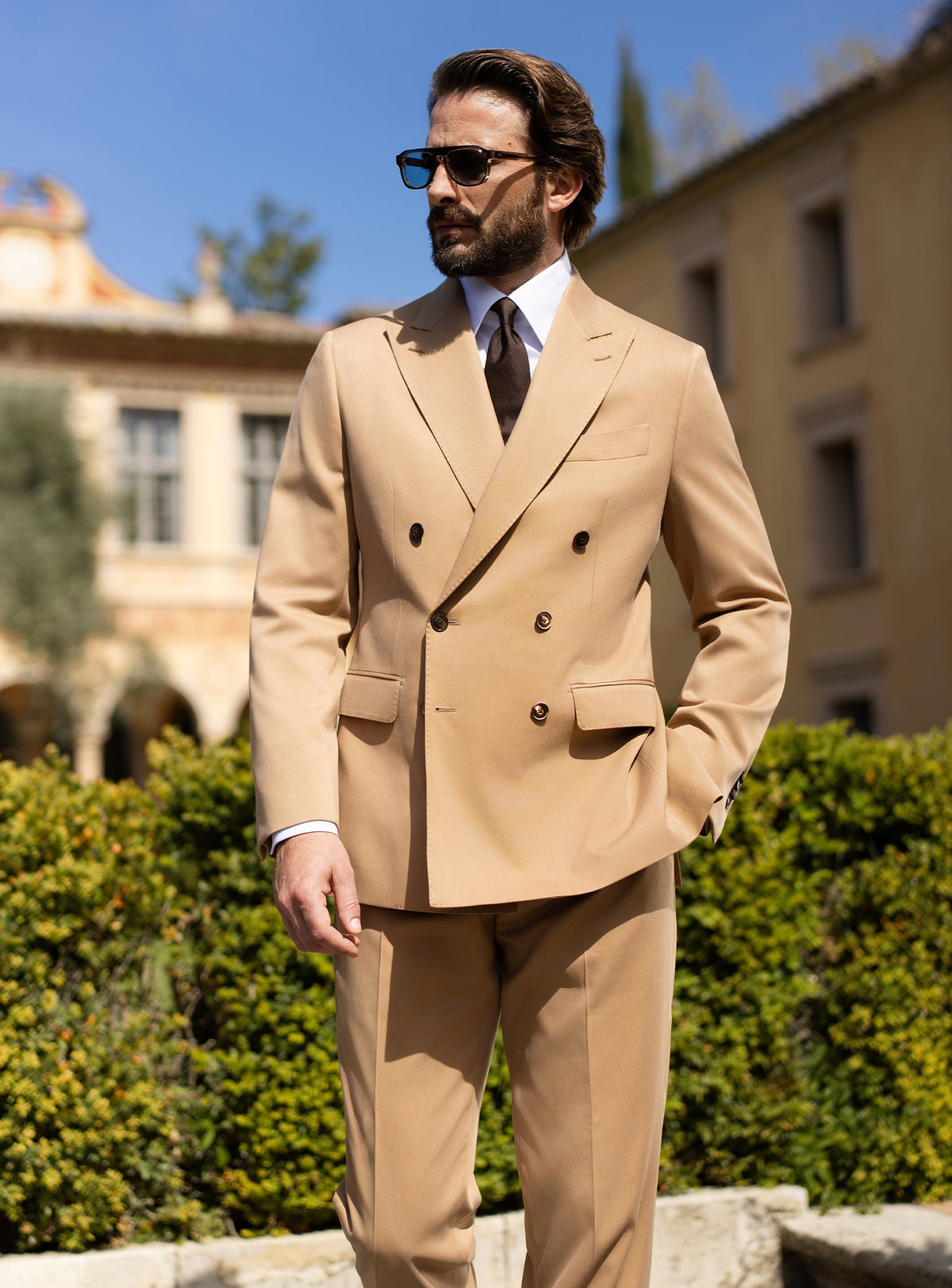Camel double-breasted Consiglieri suit with a white shirt and dark tie