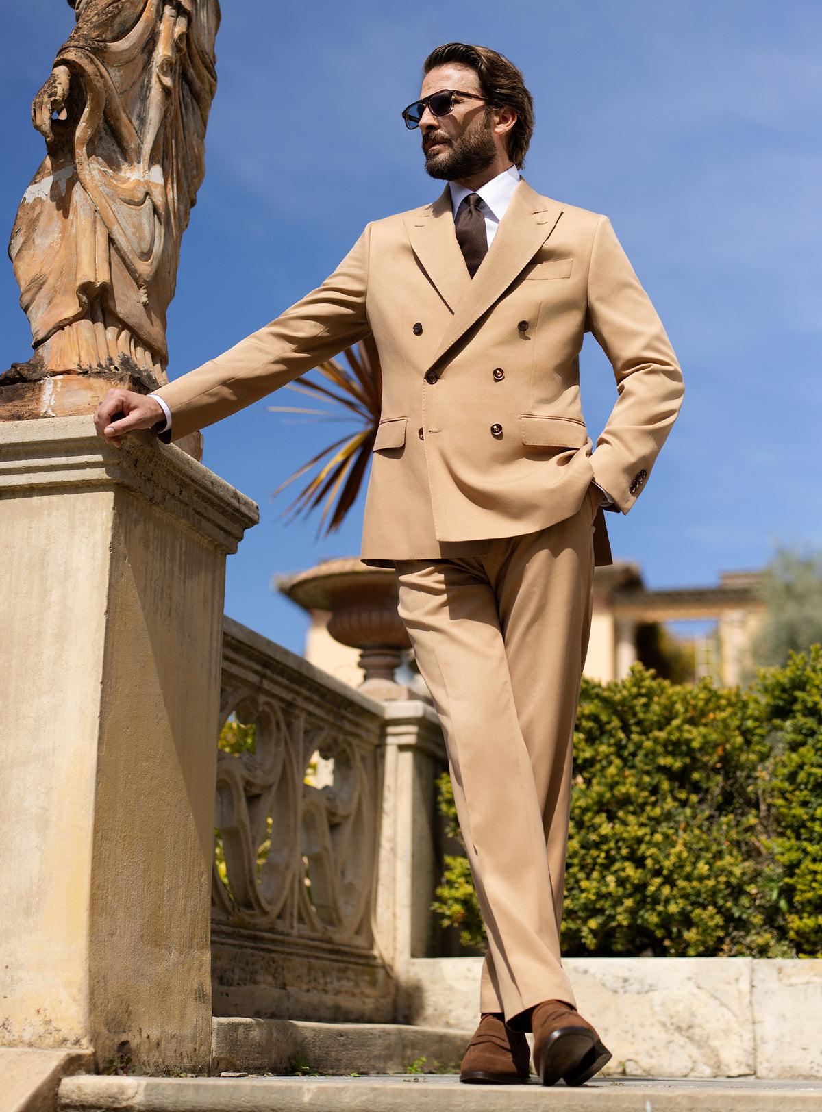 Camel double-breasted Consiglieri suit with a white shirt and dark tie