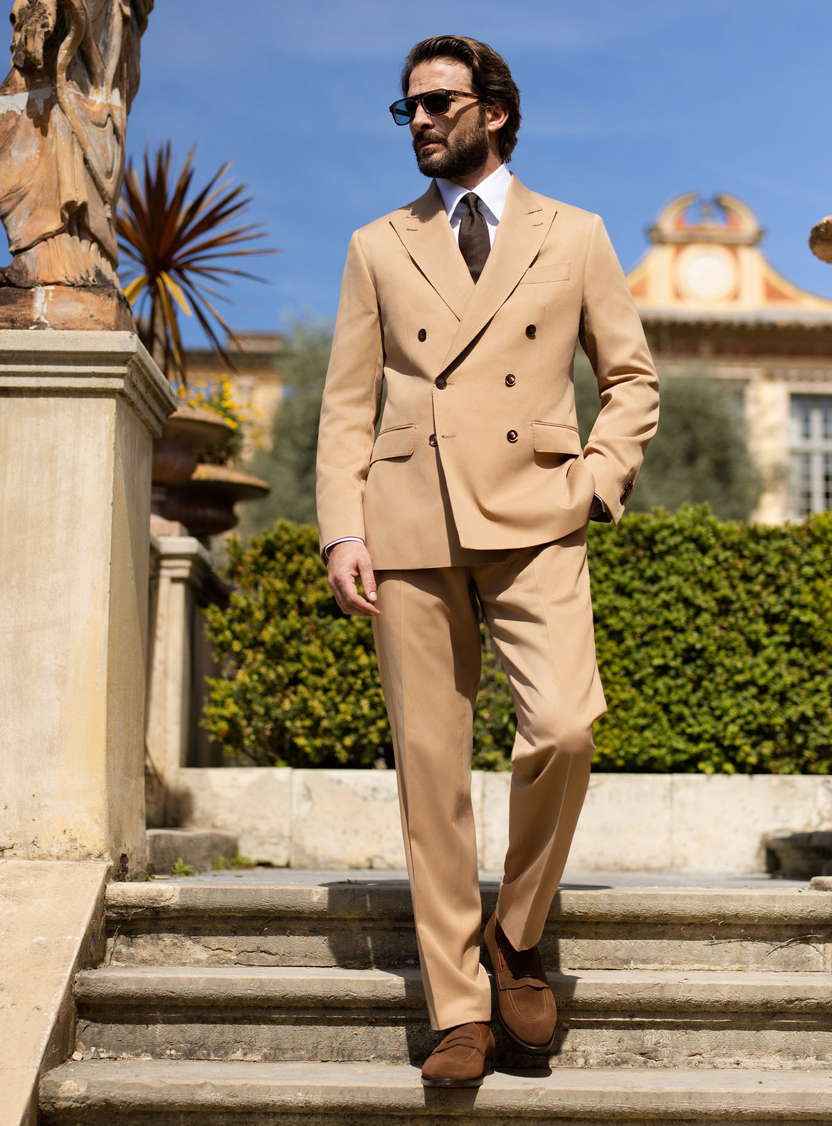 Camel double-breasted Consiglieri suit with a white shirt and dark tie