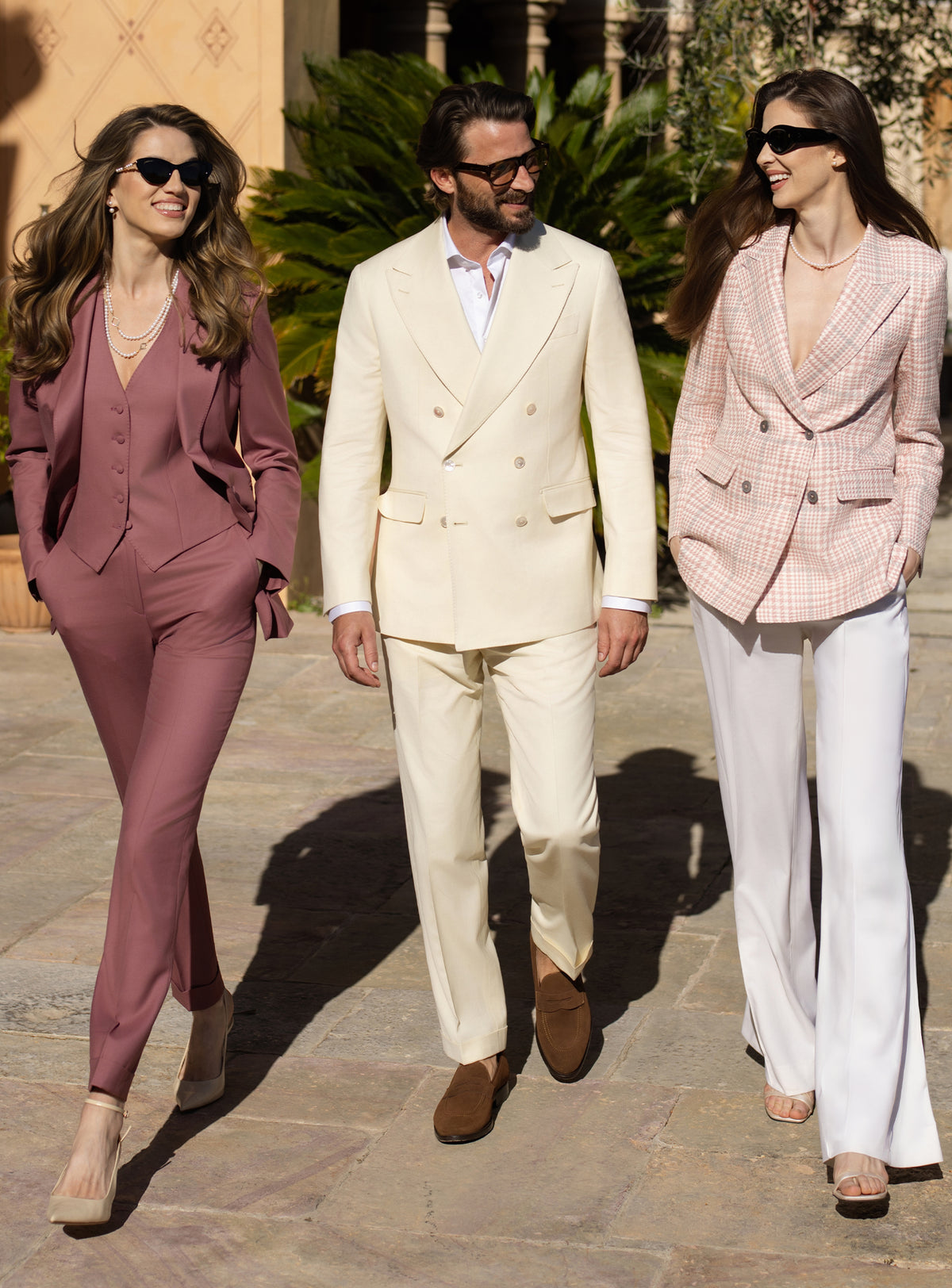 Consiglieri women's and men's tailoring in cream, blush pink and deep rose tones