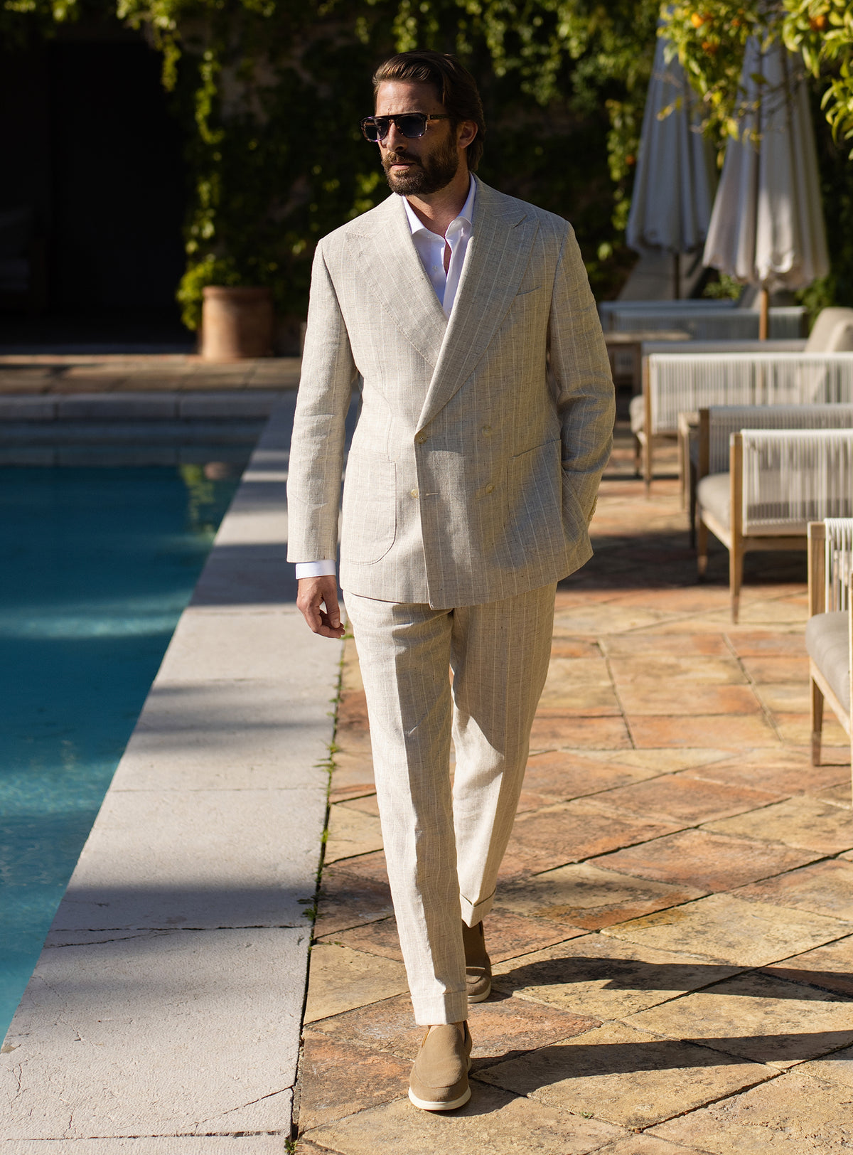 Light beige Consiglieri suit with a subtle check, worn with a white shirt