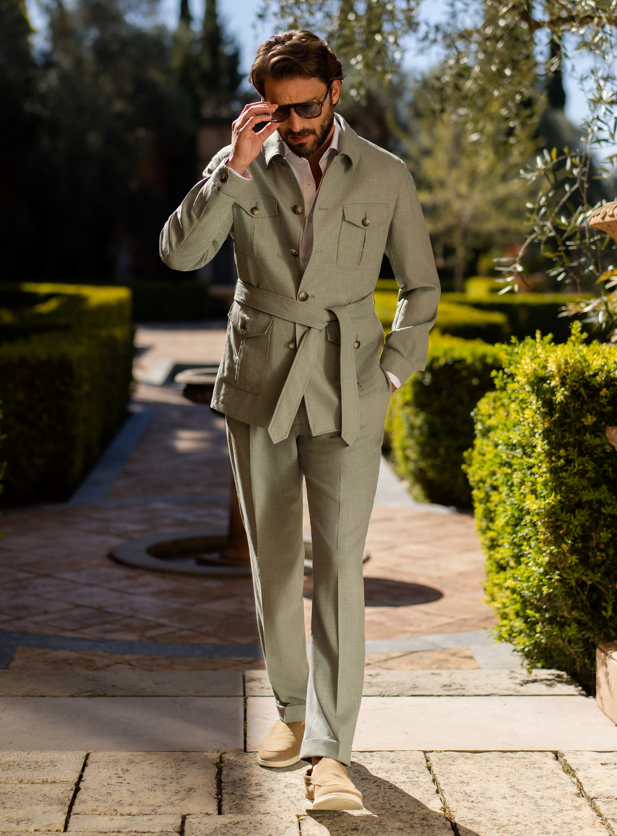 Light olive green Consiglieri ensemble with a belted jacket and matching trousers
