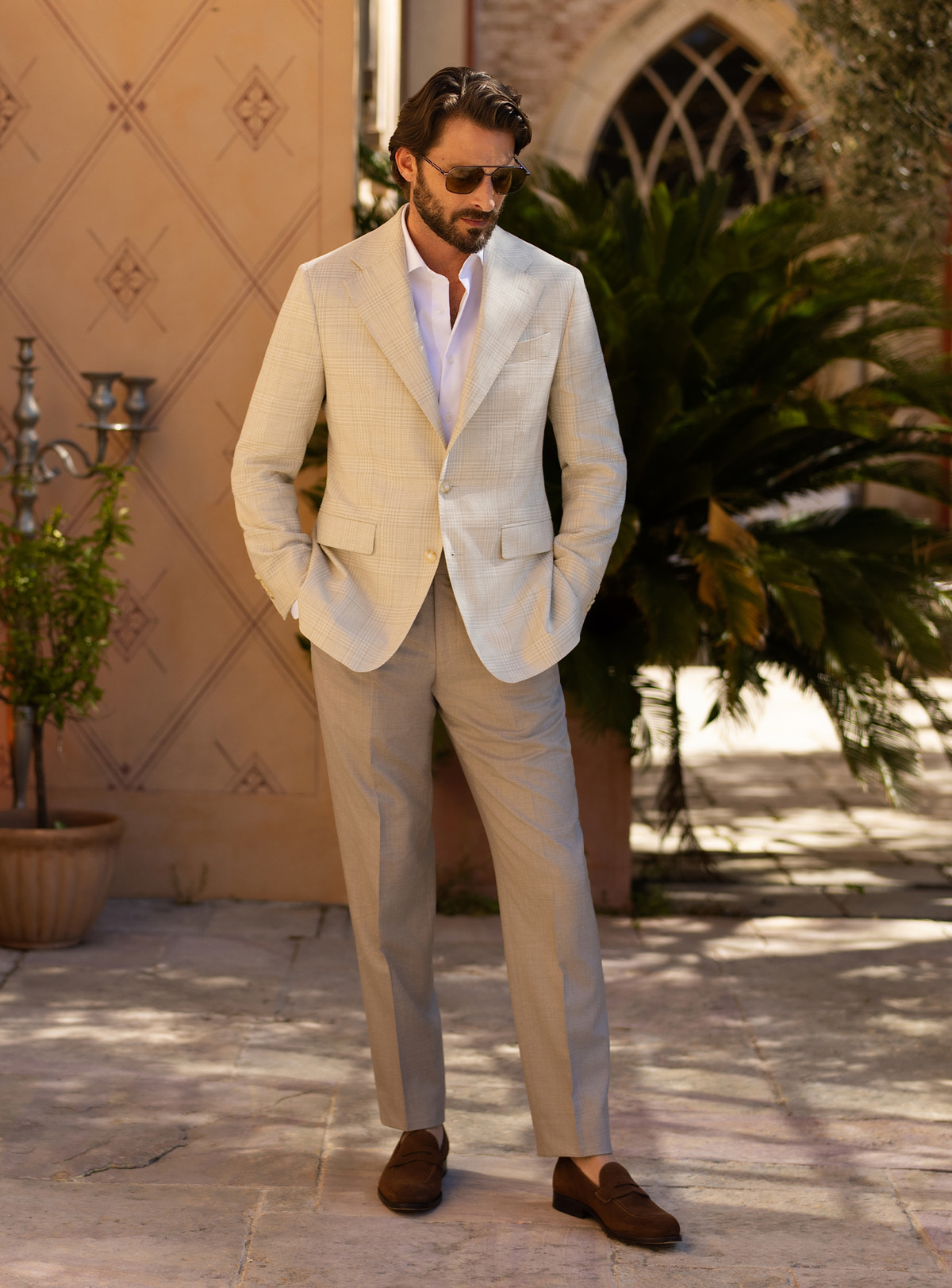 Cream Consiglieri blazer with patch pockets, a white shirt and taupe trousers