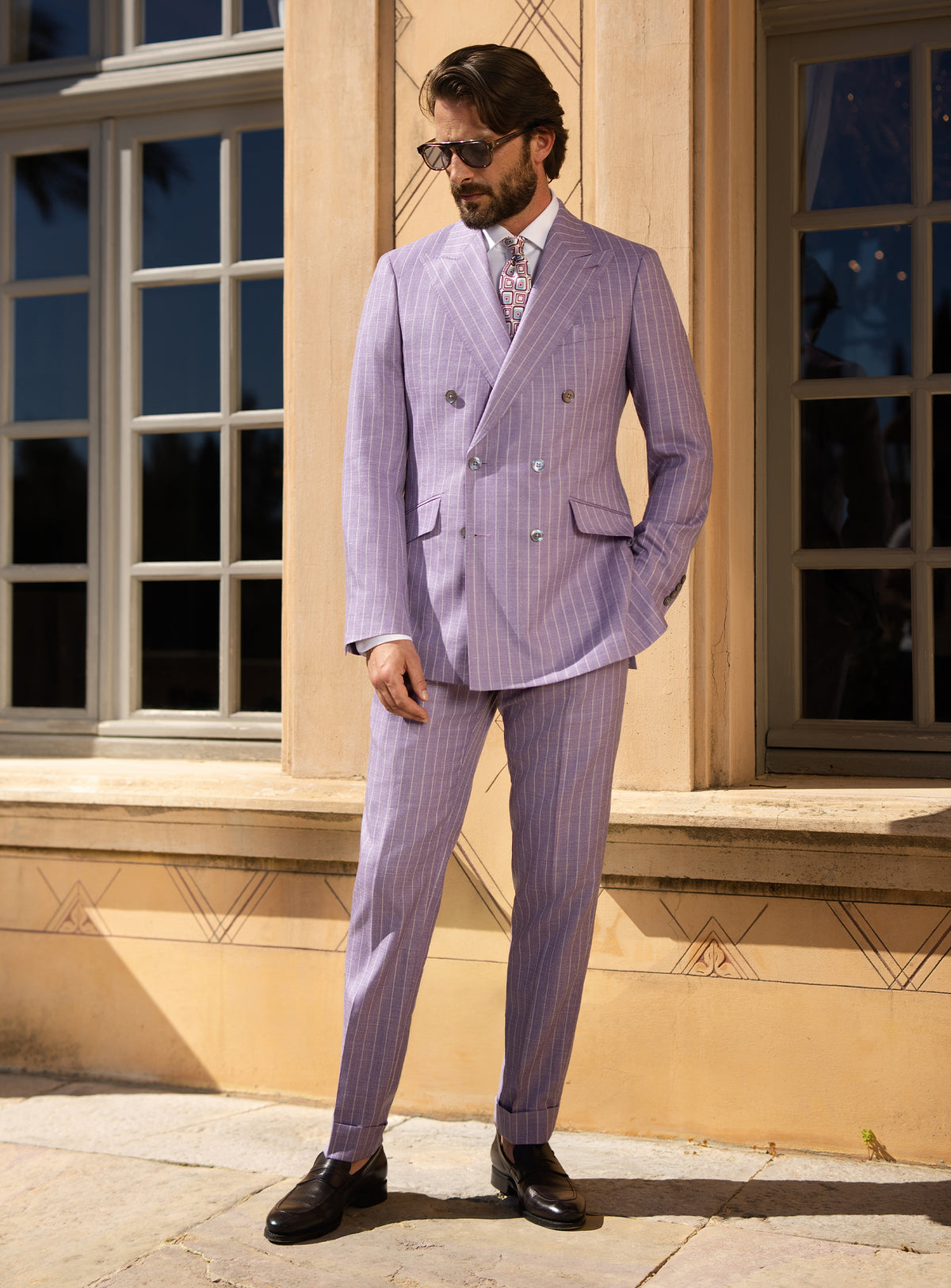 Lilac double-breasted Consiglieri suit worn with a white shirt