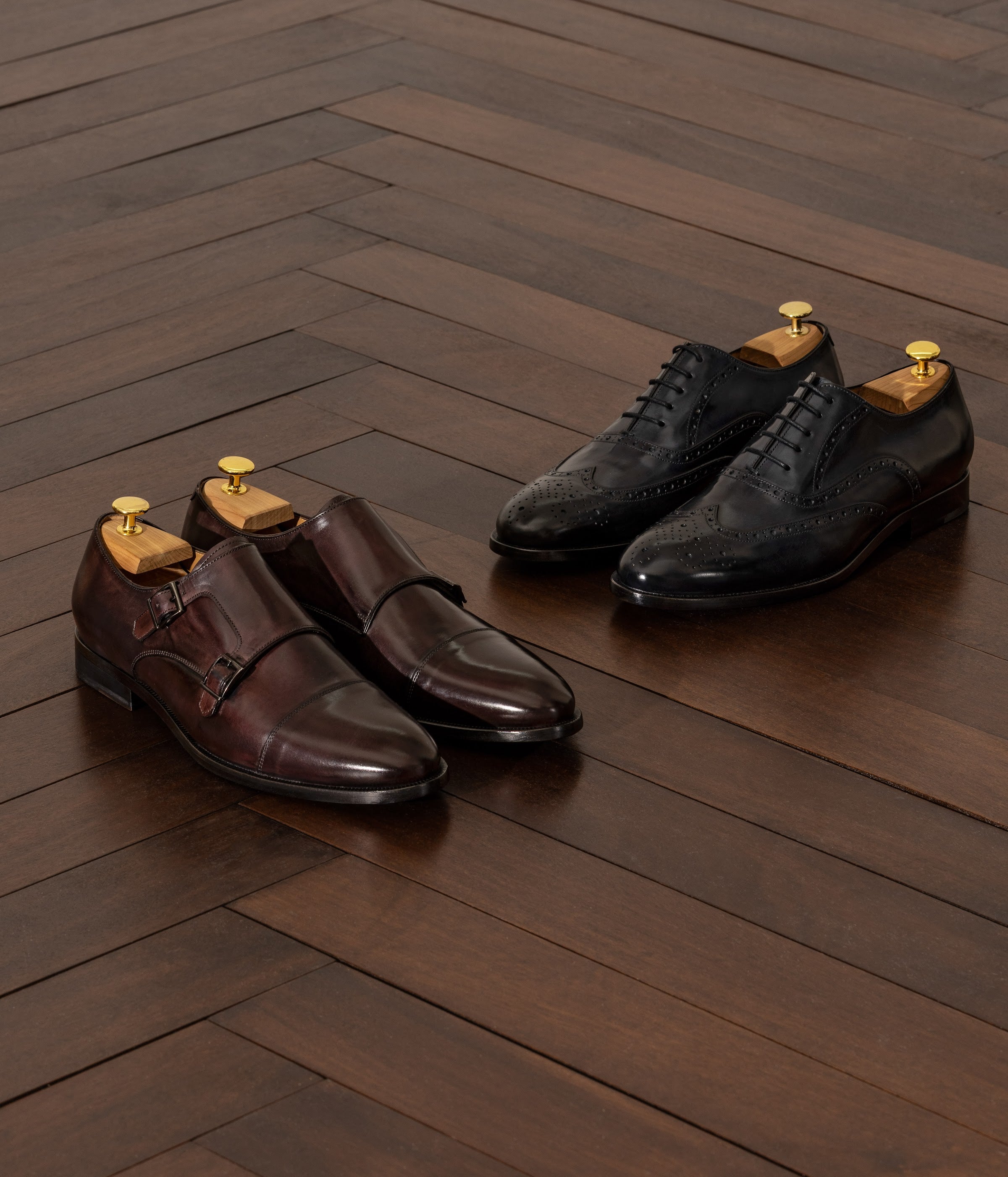 Made-to-Order Consiglieri shoes — double monks and brogues in brown and black leather.