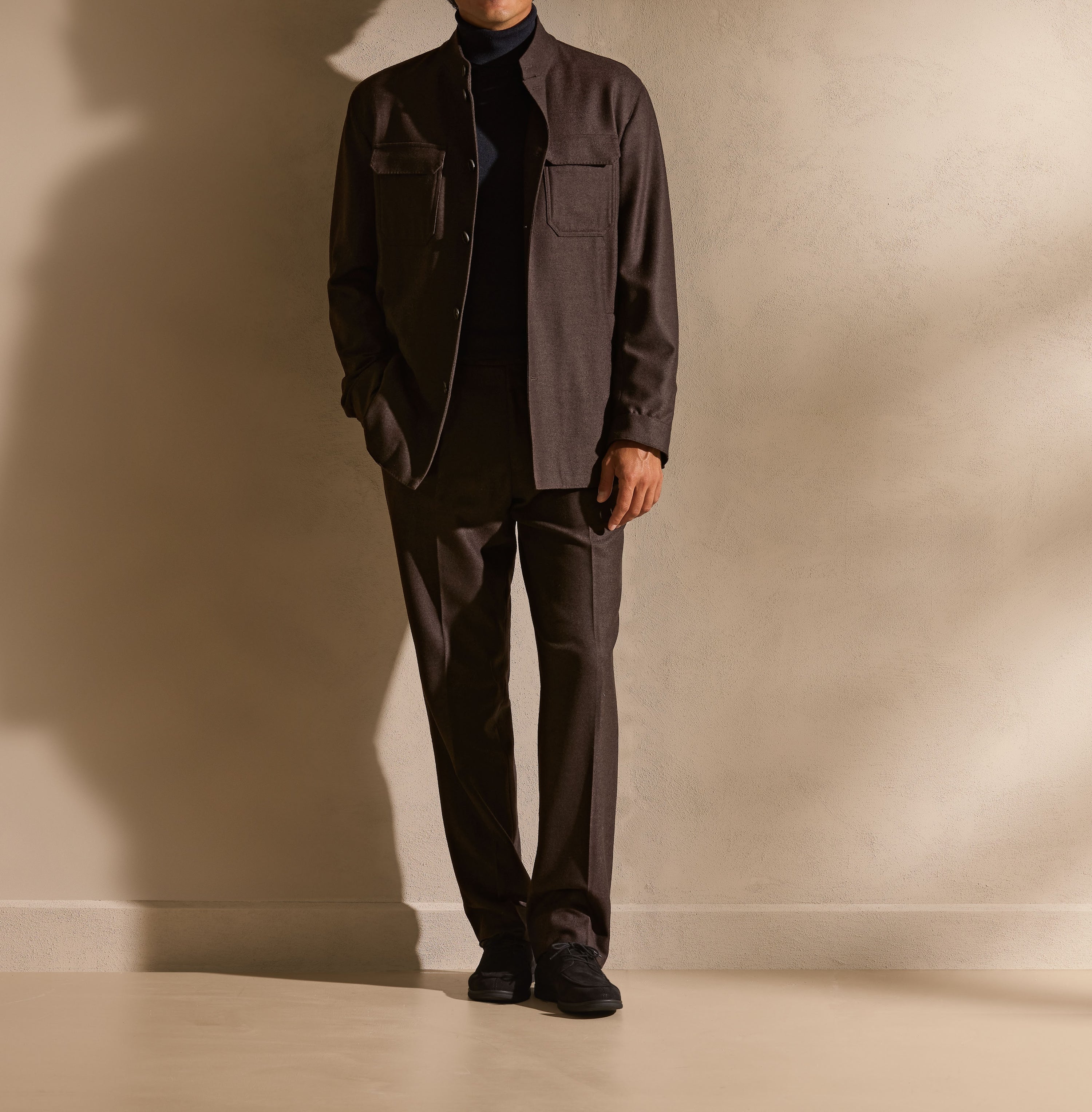 A Nehru-collar jacket at the centre of a contemporary total look.