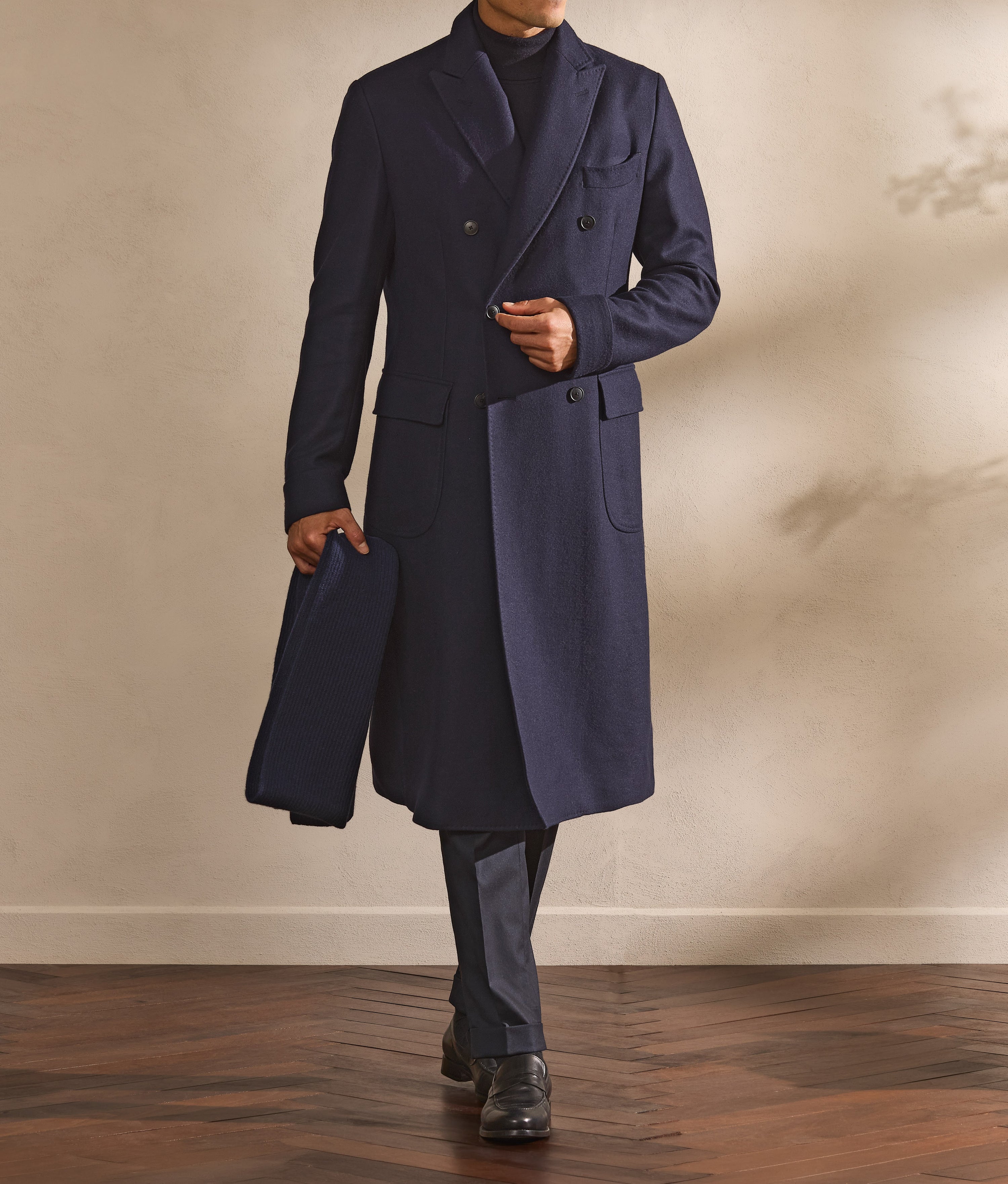 A total look built around the navy double-breasted Overcoat.