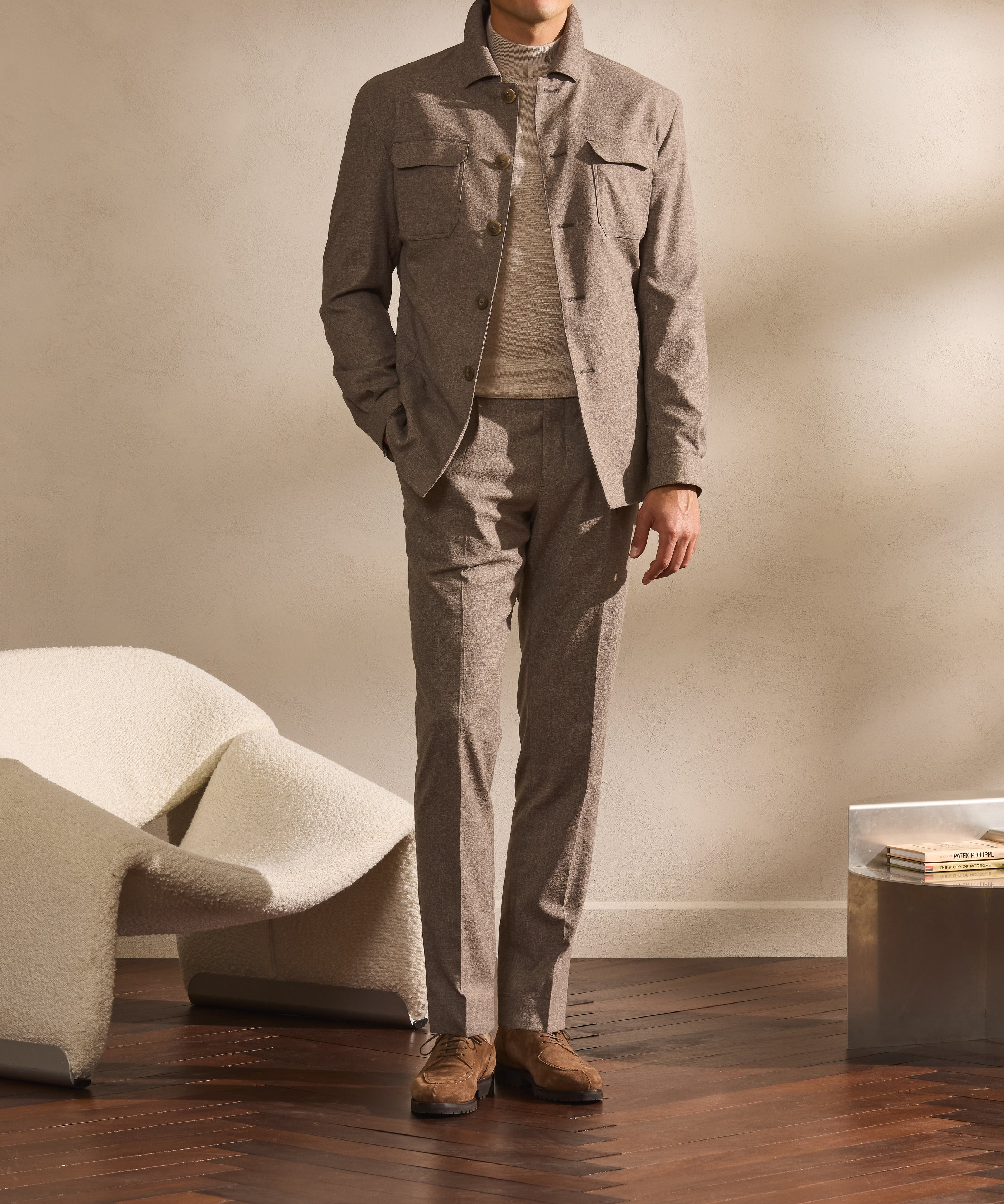 Taupe safari jacket with trousers in the same shade, for a warm, cohesive silhouette.