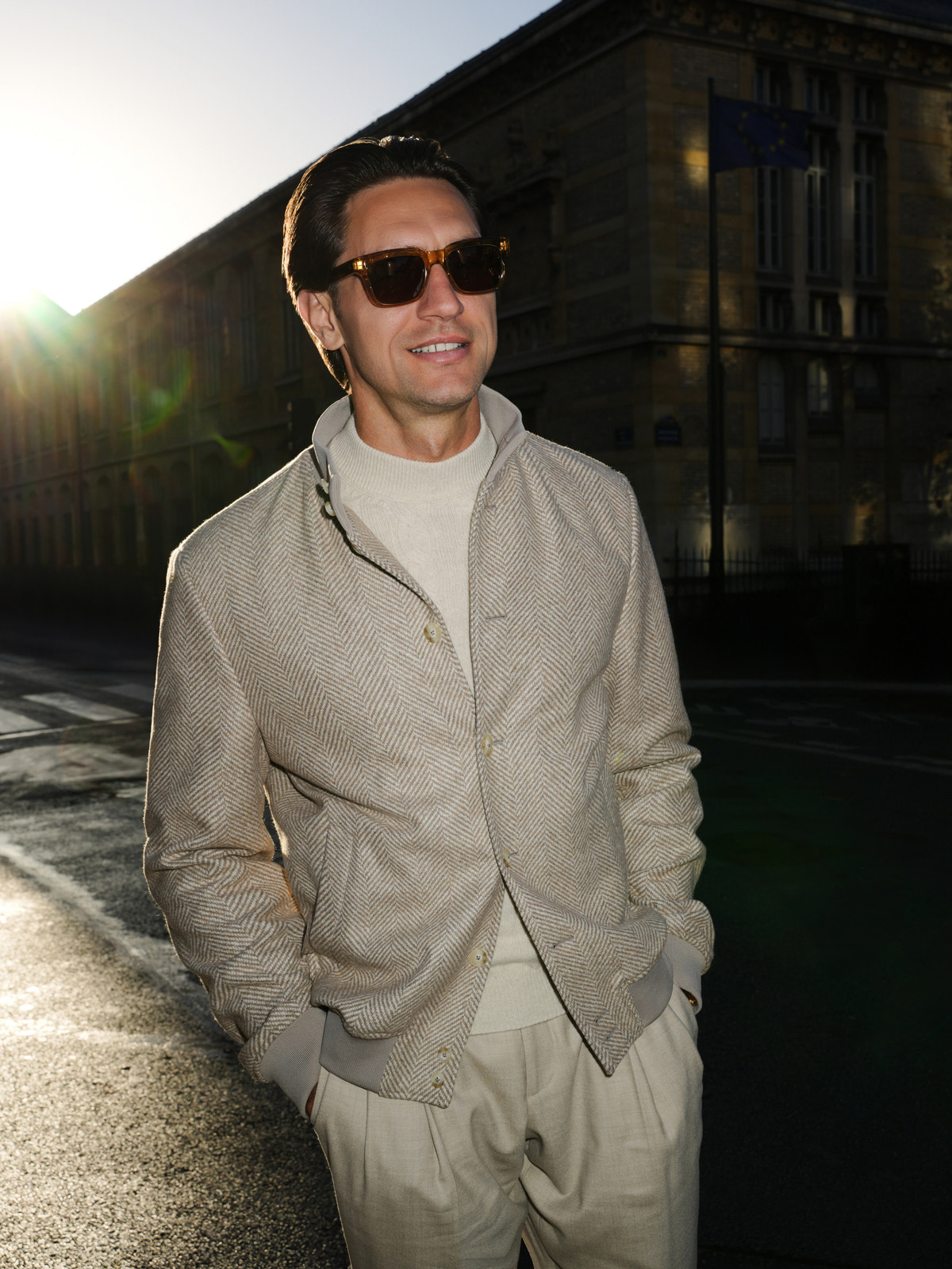 Beige Consiglieri jacket styled with matching trousers