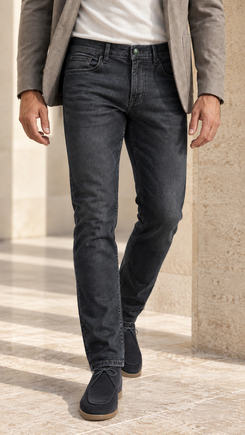 Front close-up of the look with charcoal denim and a grey blazer.