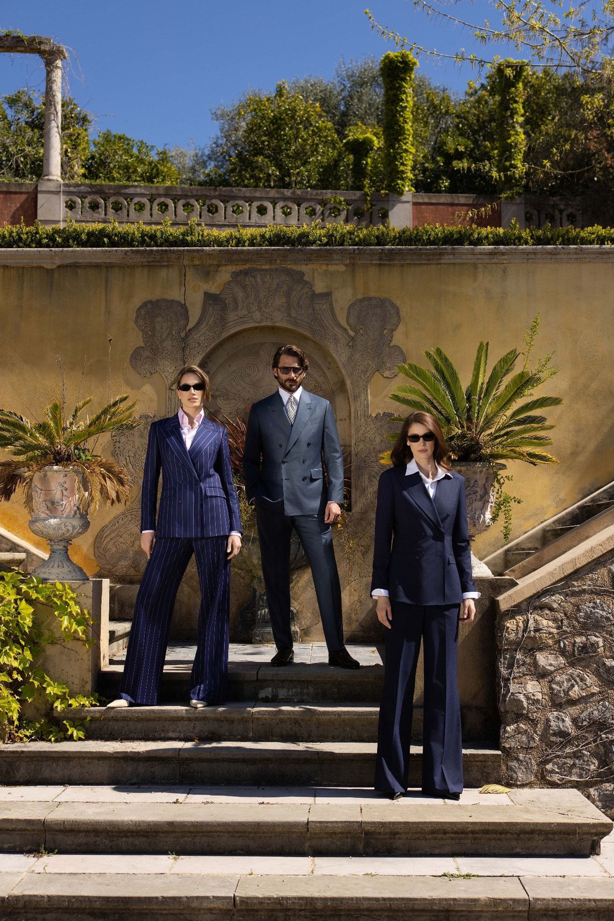 Three Consiglieri MEN and DONNA looks in shades of blue on stone steps