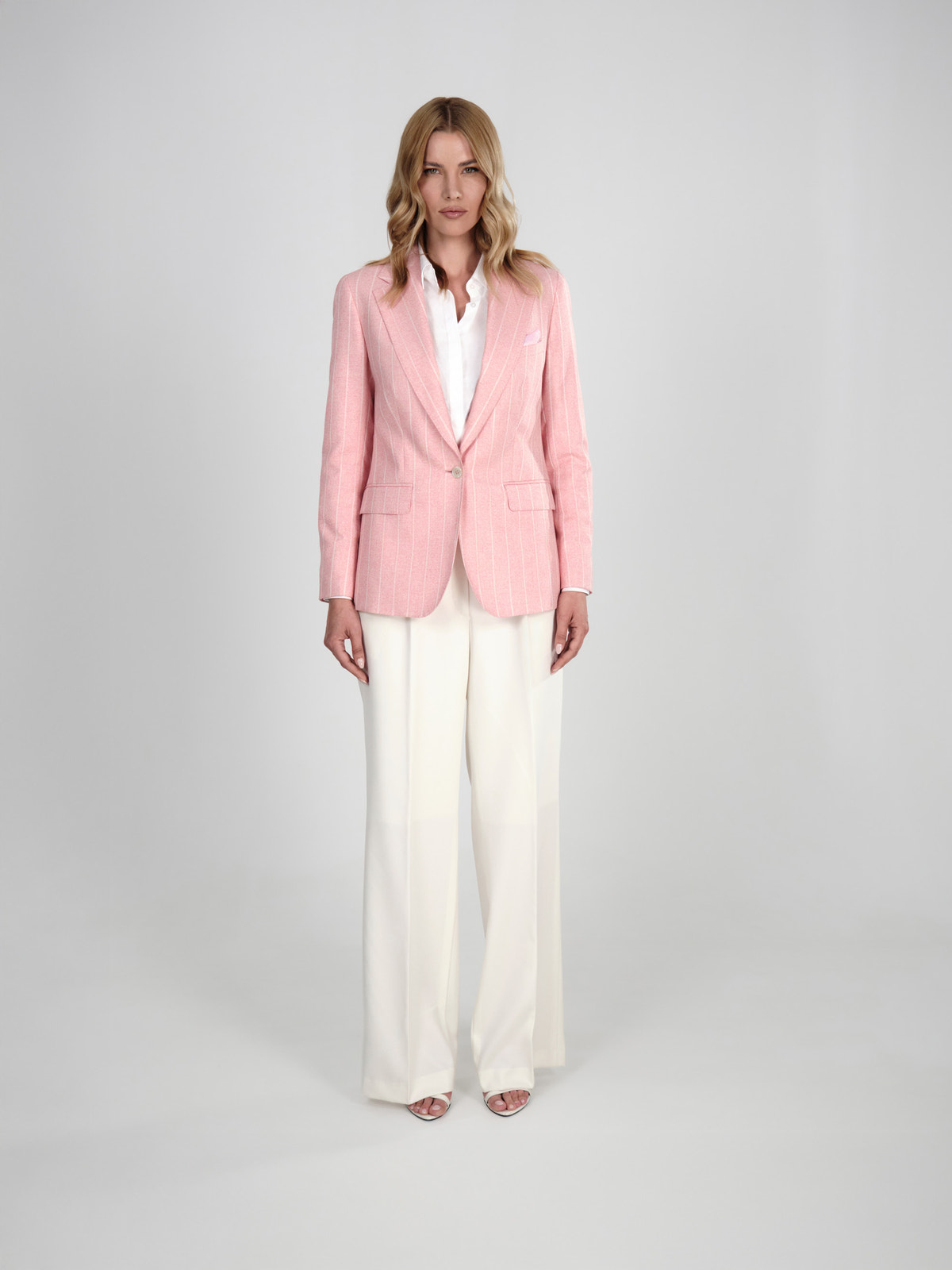 Pale pink Consiglieri DONNA blazer with a white shirt and cream wide-leg trousers