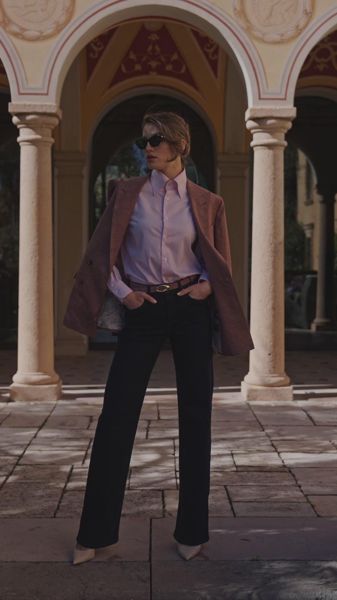 Consiglieri Montclair ensemble with a pink blazer and dark flared trousers