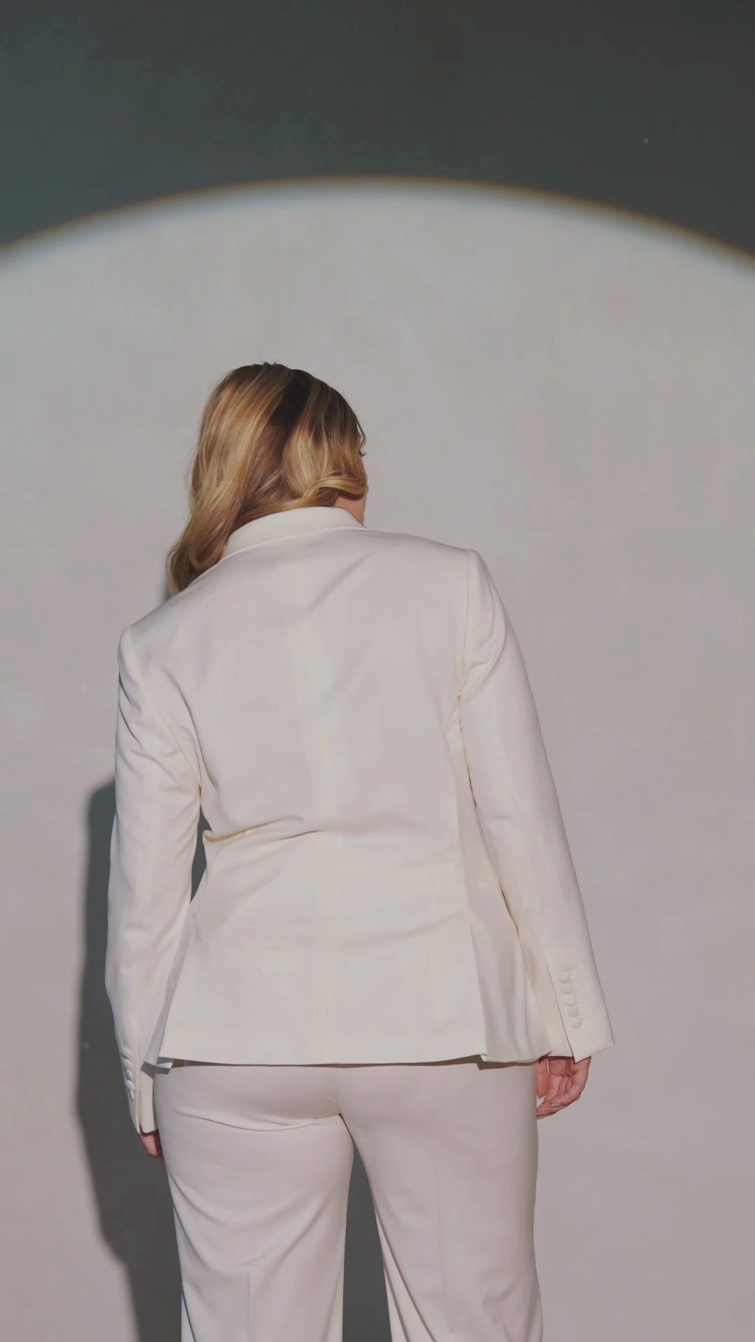 Consiglieri The Riviera Suit women's ensemble with a defined waist and ivory trousers