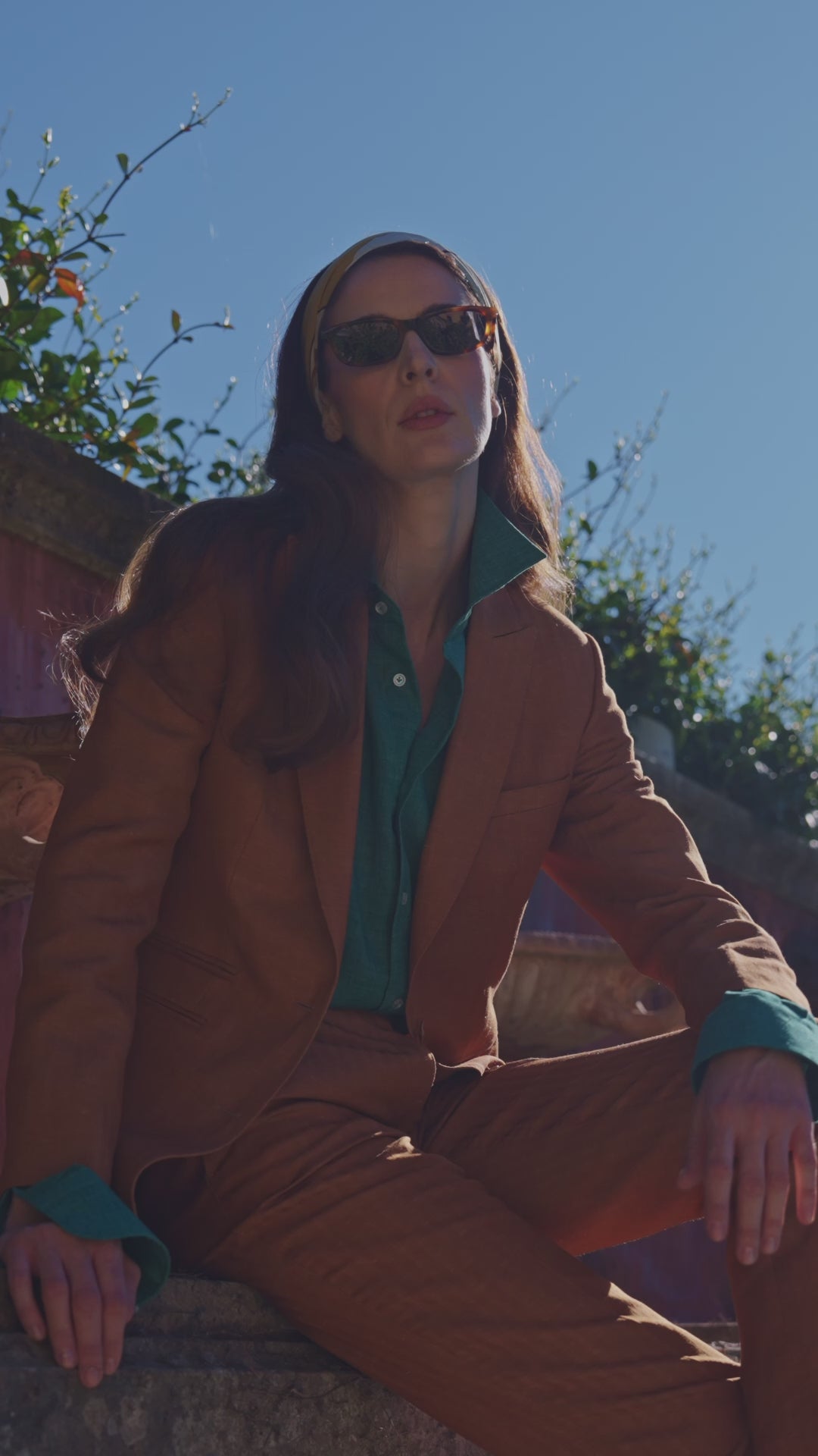 Copper Consiglieri Villefranche women's suit with a green blouse in a garden