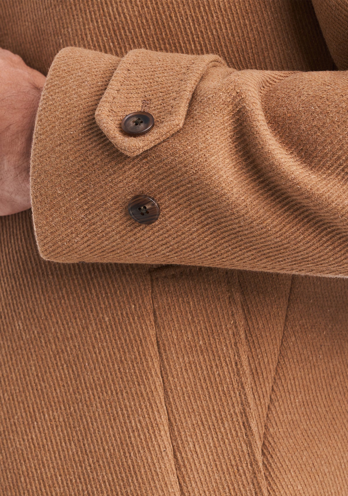 Consiglieri Verona: buttoned cuff tab and diagonal texture in camel