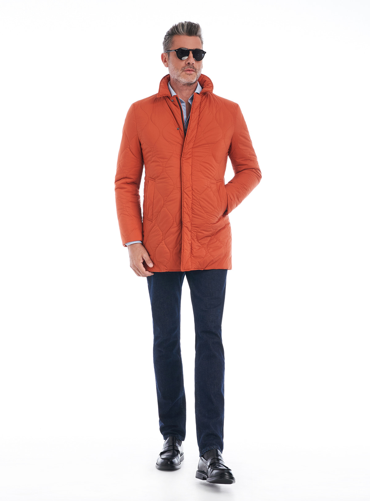 Consiglieri Bassel: orange quilted jacket with a raised collar