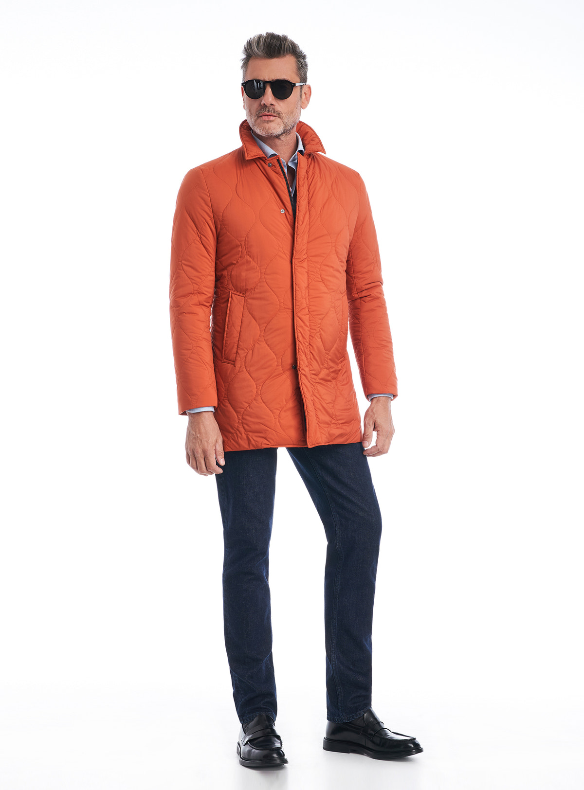 Consiglieri Bassel: orange quilted jacket with a raised collar