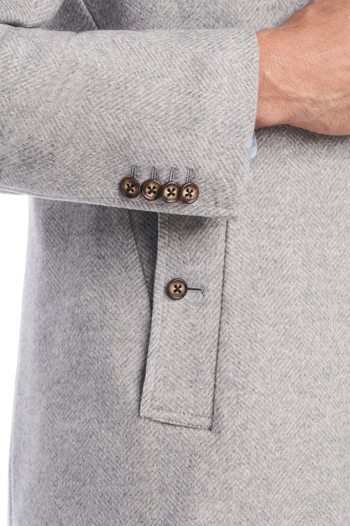 Consiglieri Florence: buttoned cuff and pocket of the light grey overcoat