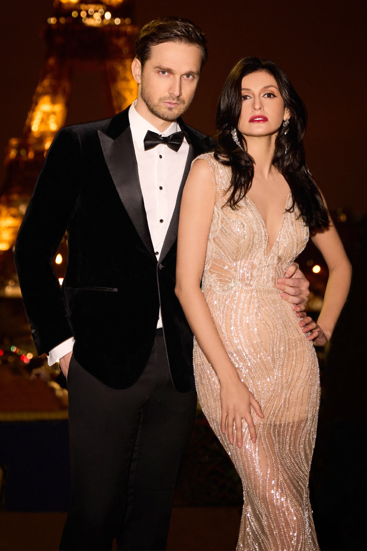 Consiglieri: black tuxedo jacket with lustrous lapels beside an evening gown