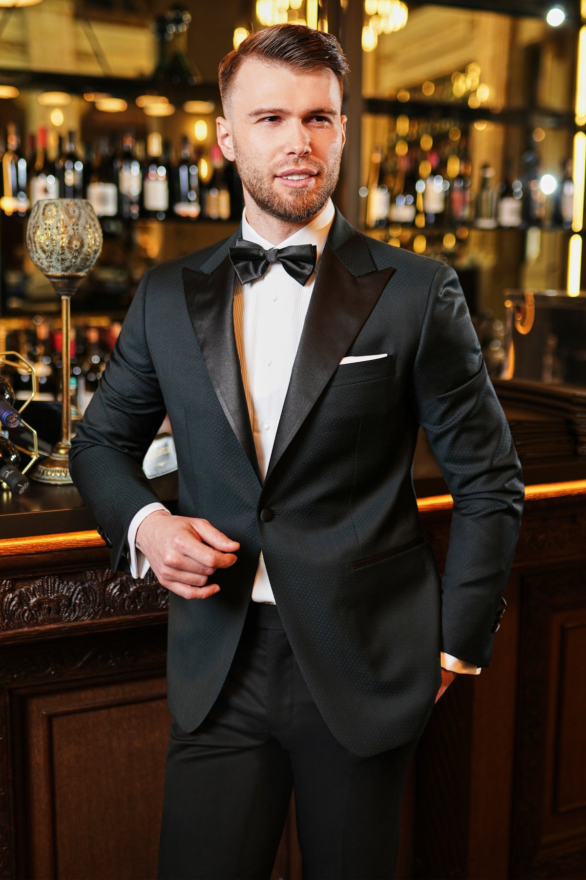 Consiglieri: black tuxedo with lustrous lapels, a white shirt and black bow tie