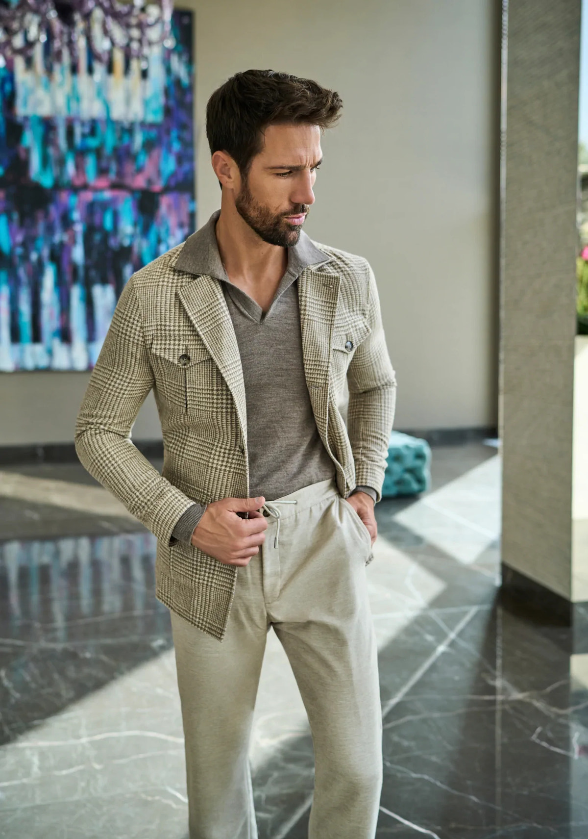 Consiglieri Le Mains: cream high-waisted trousers styled with a light jacket