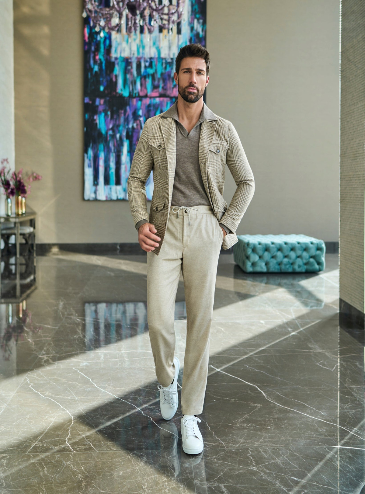 Consiglieri Le Mains: cream high-waisted trousers styled with a light jacket