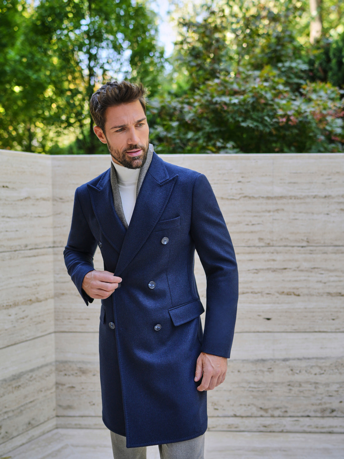Consiglieri San Cassiano: double-breasted navy overcoat with grey trousers