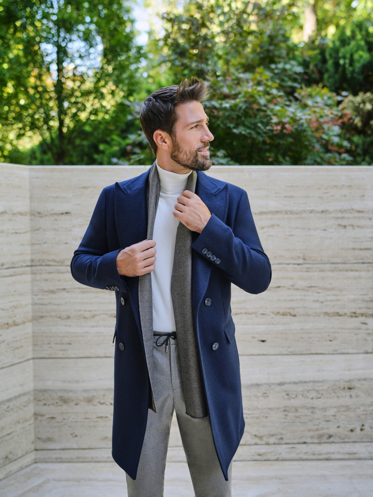 Consiglieri San Cassiano: double-breasted navy overcoat with grey trousers