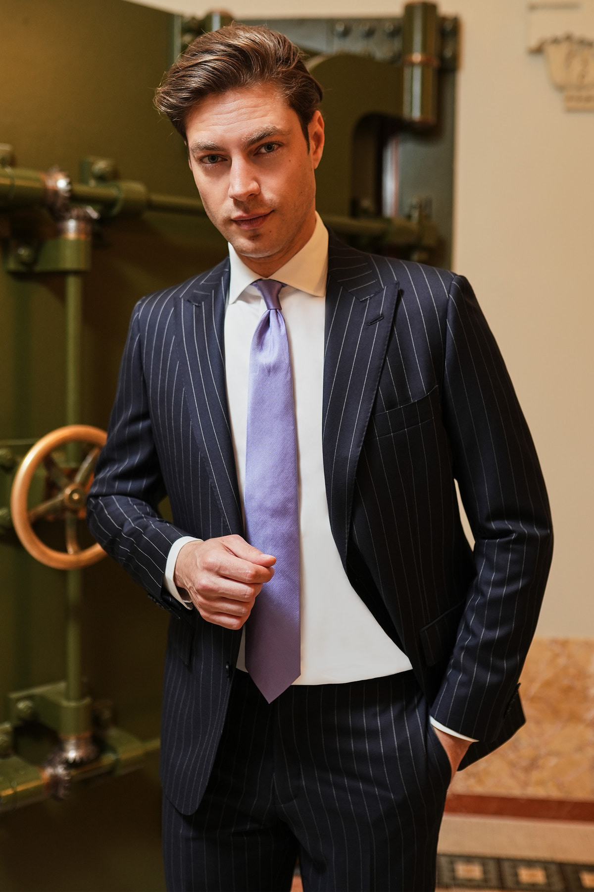 Consiglieri Toronto: navy pinstripe suit with a lilac tie