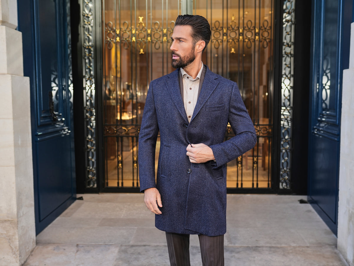 Consiglieri Zermatt: navy textured overcoat styled with brown trousers
