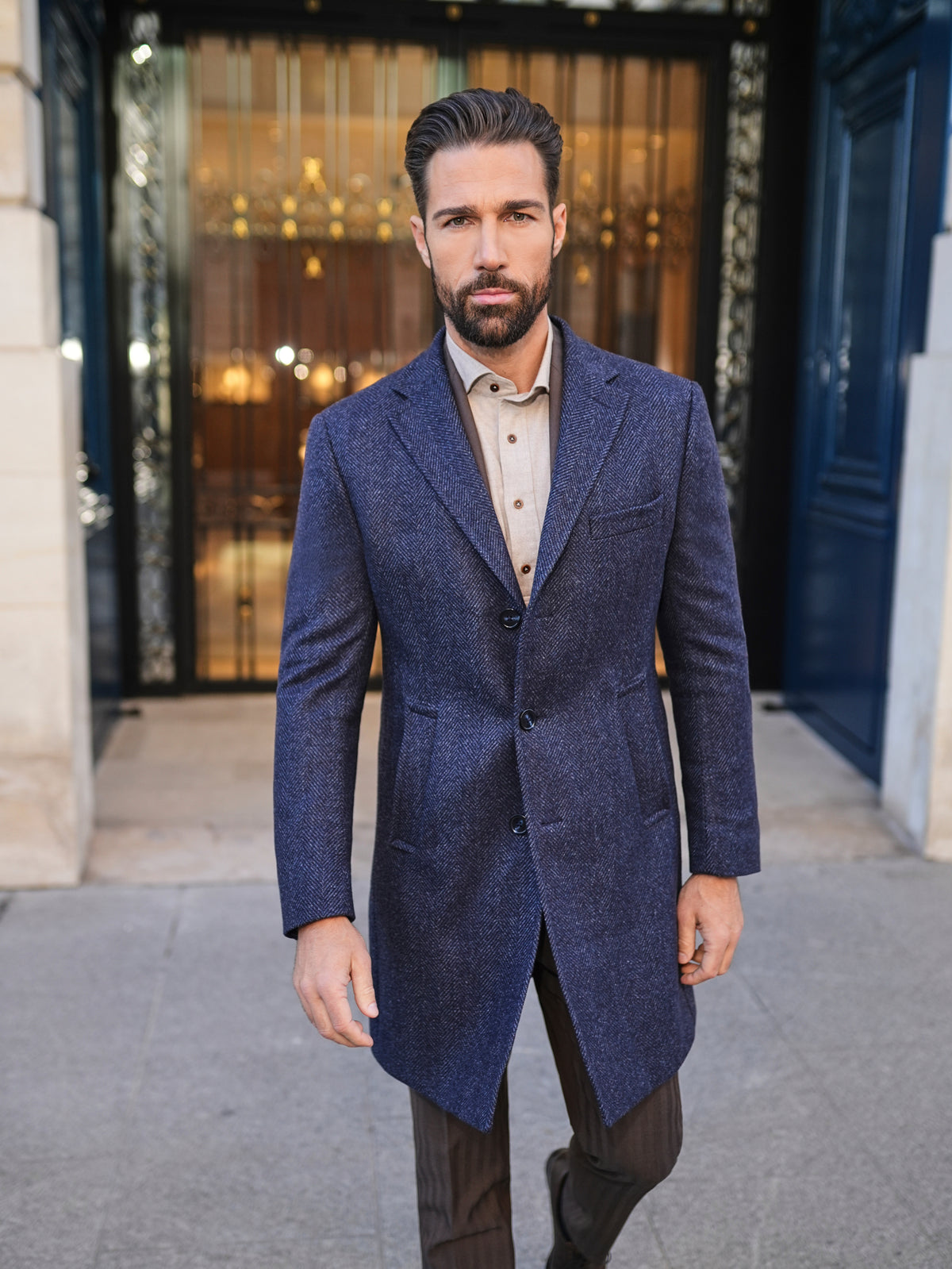 Consiglieri Zermatt: navy textured overcoat styled with brown trousers