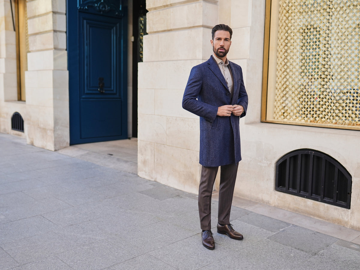 Consiglieri Zermatt: navy textured overcoat styled with brown trousers