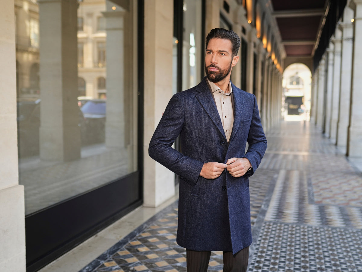 Consiglieri Zermatt: navy textured overcoat styled with brown trousers