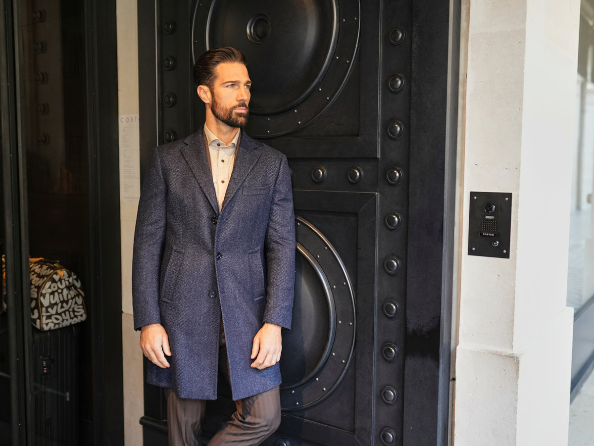 Consiglieri Zermatt: navy textured overcoat styled with brown trousers