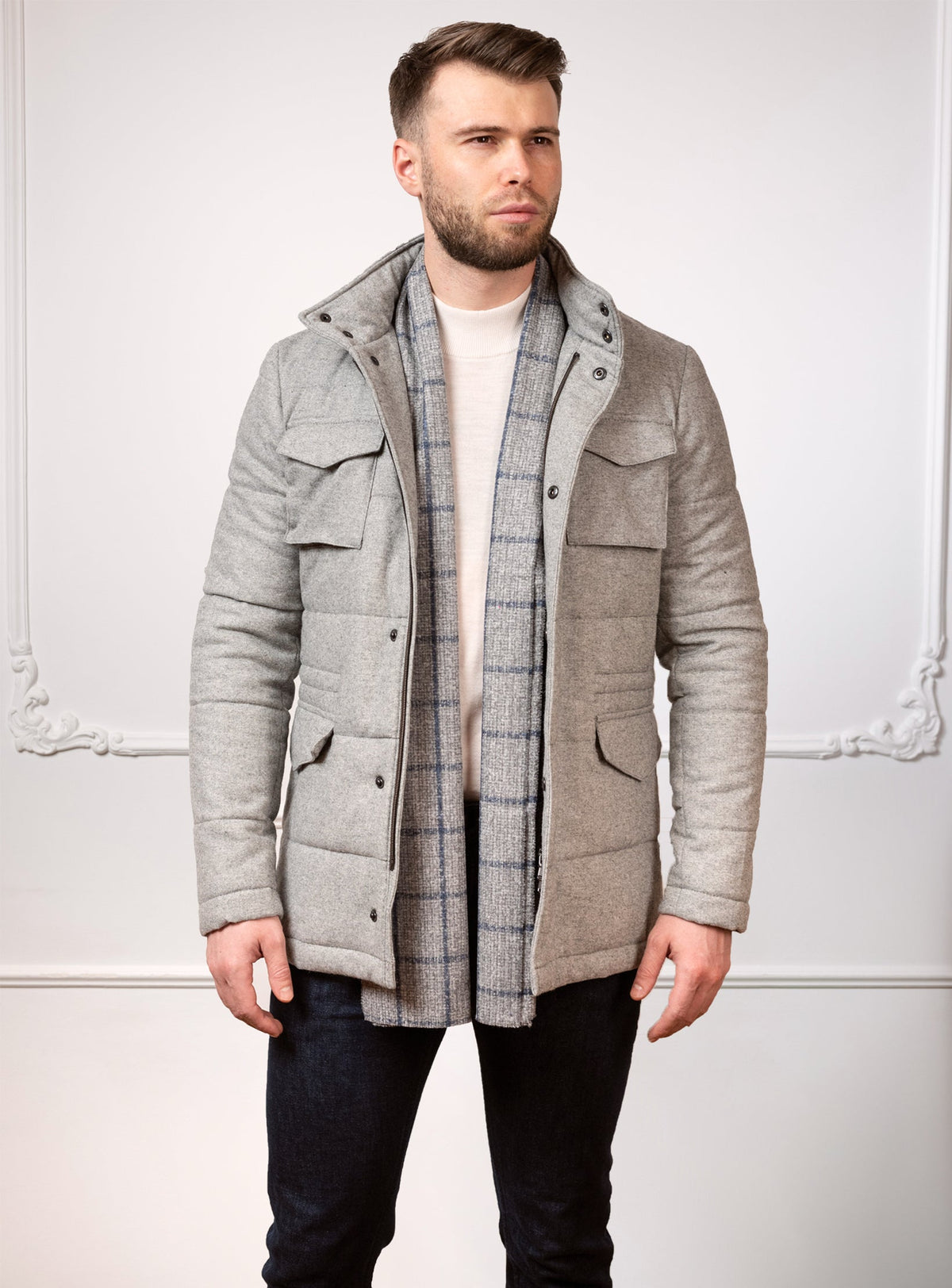 Consiglieri San Cassian: grey quilted jacket with patch pockets and a checked scarf