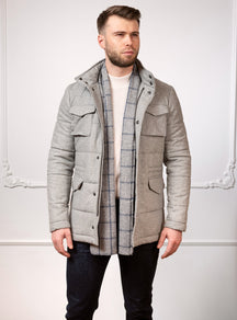 Consiglieri San Cassian: grey quilted jacket with patch pockets and a checked scarf