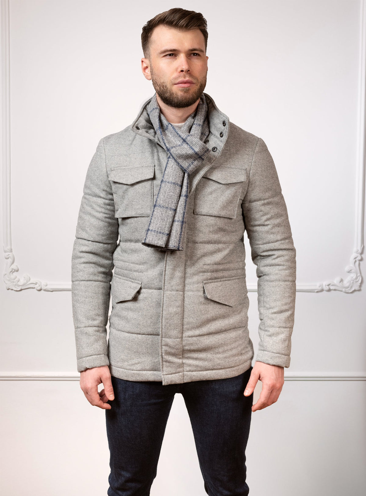 Consiglieri San Cassian: grey quilted jacket with patch pockets and a checked scarf