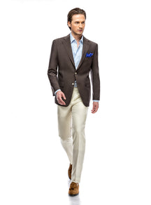 Consiglieri Sardinia: dark brown jacket with cream trousers and a blue shirt