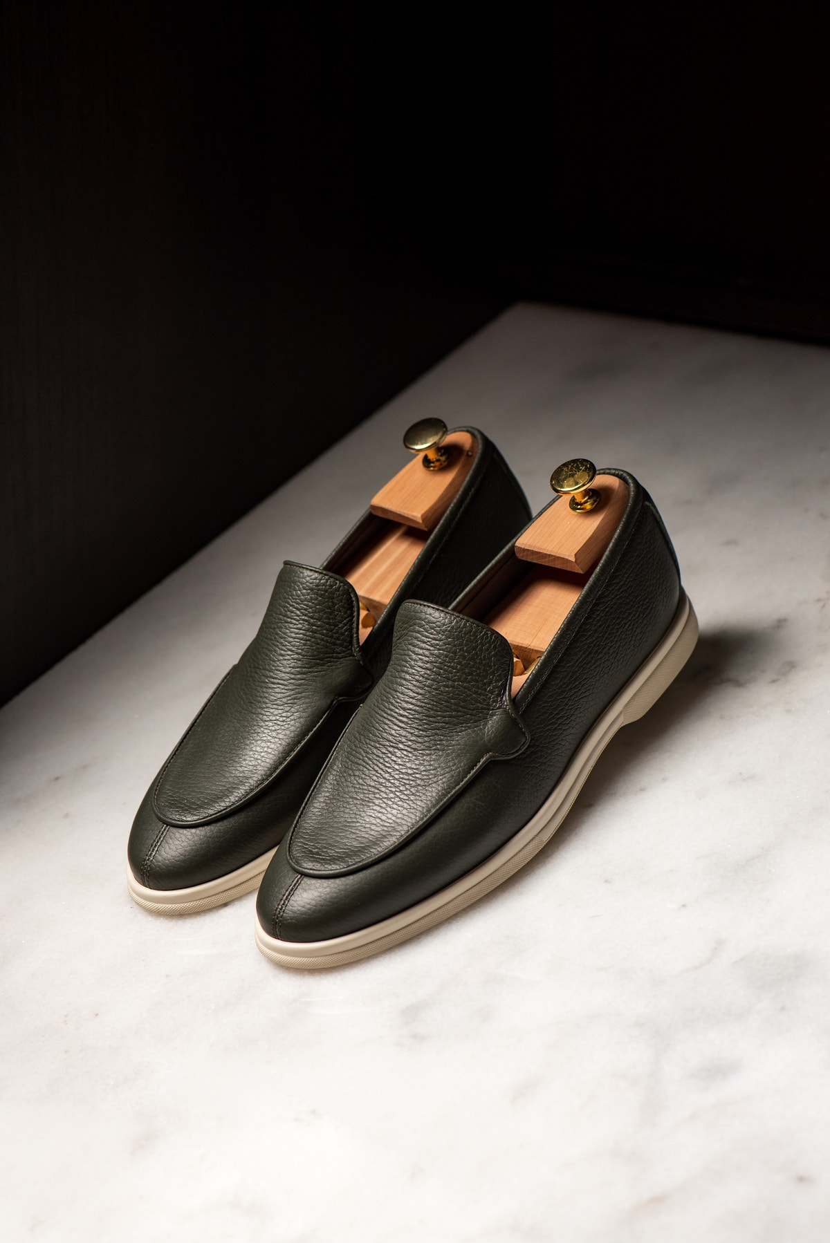 Consiglieri: dark green loafers with a smooth finish and pale soles