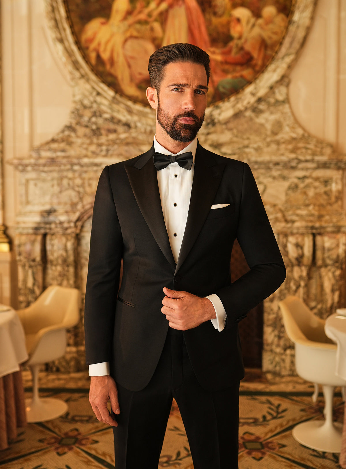 Consiglieri: black tuxedo with peak lapels and a black bow tie