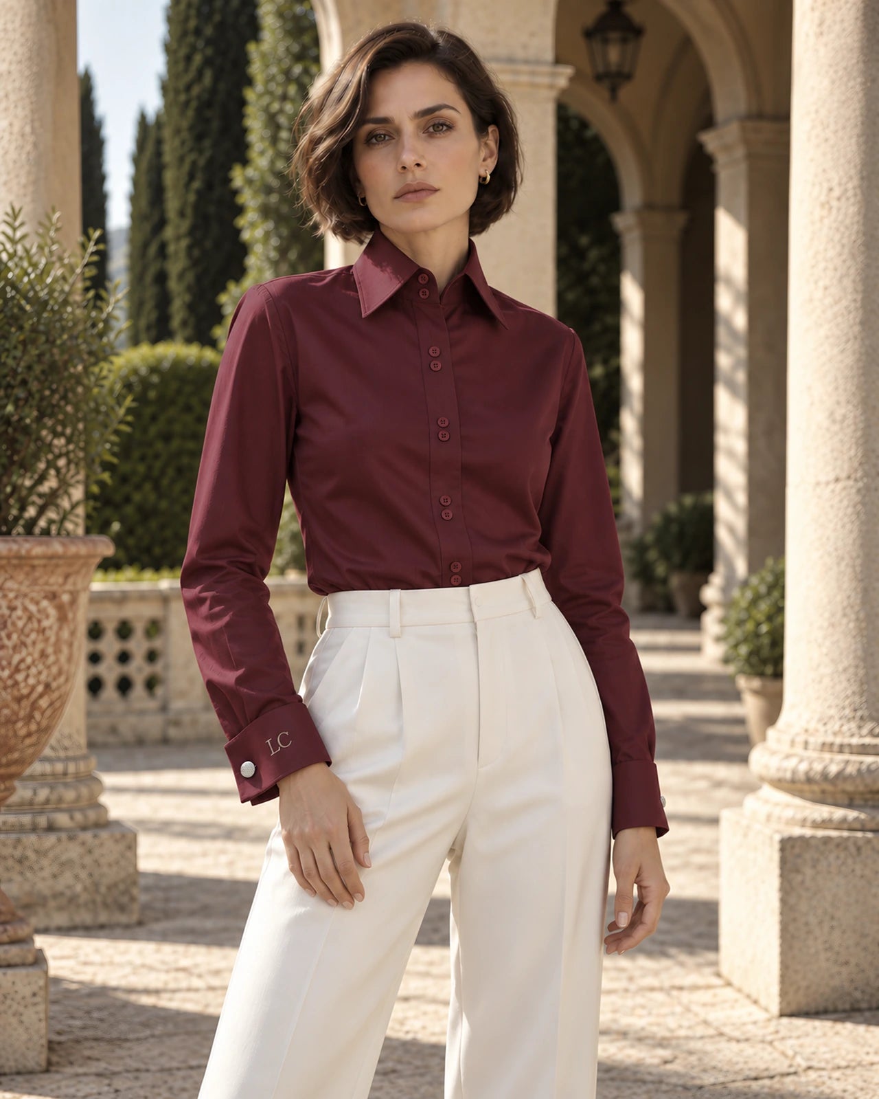 Camilla: A statement collar with a two-button stand. Rounded double cuffs for cufflinks.