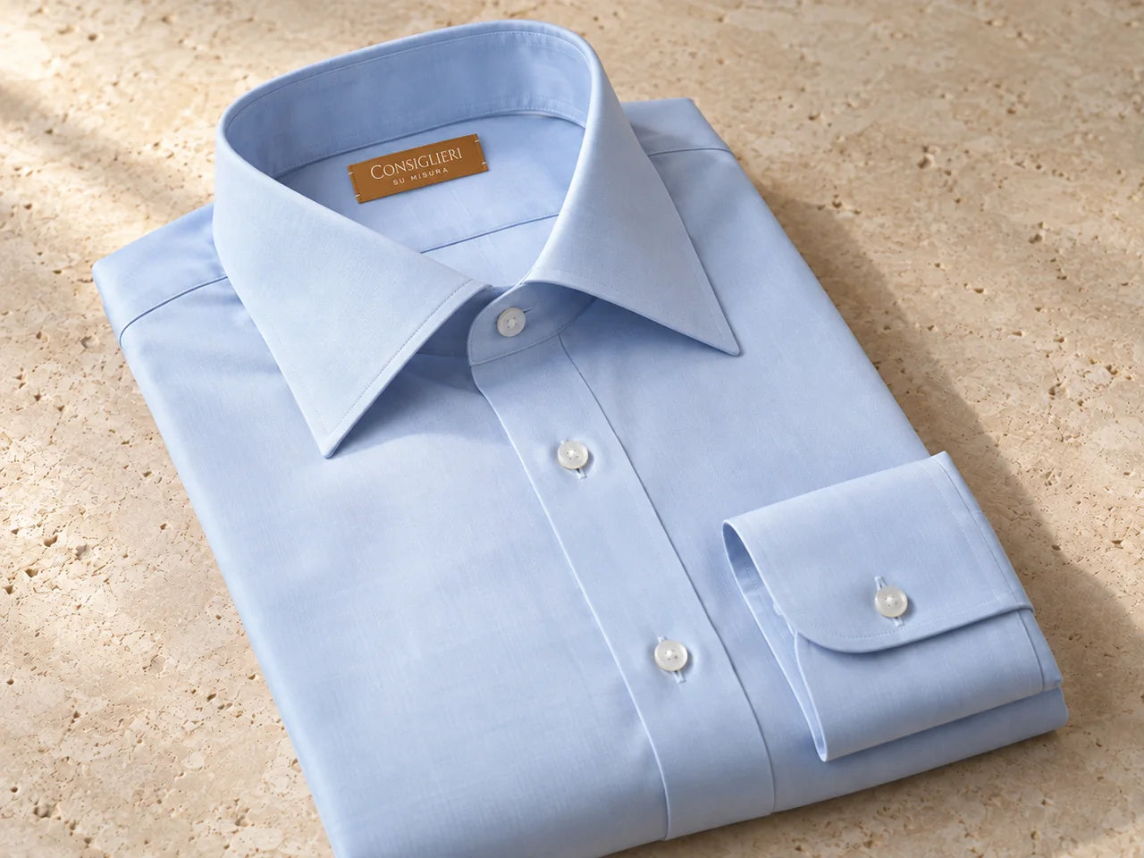 Pale blue shirt with a classic collar and Consiglieri Su Misura label