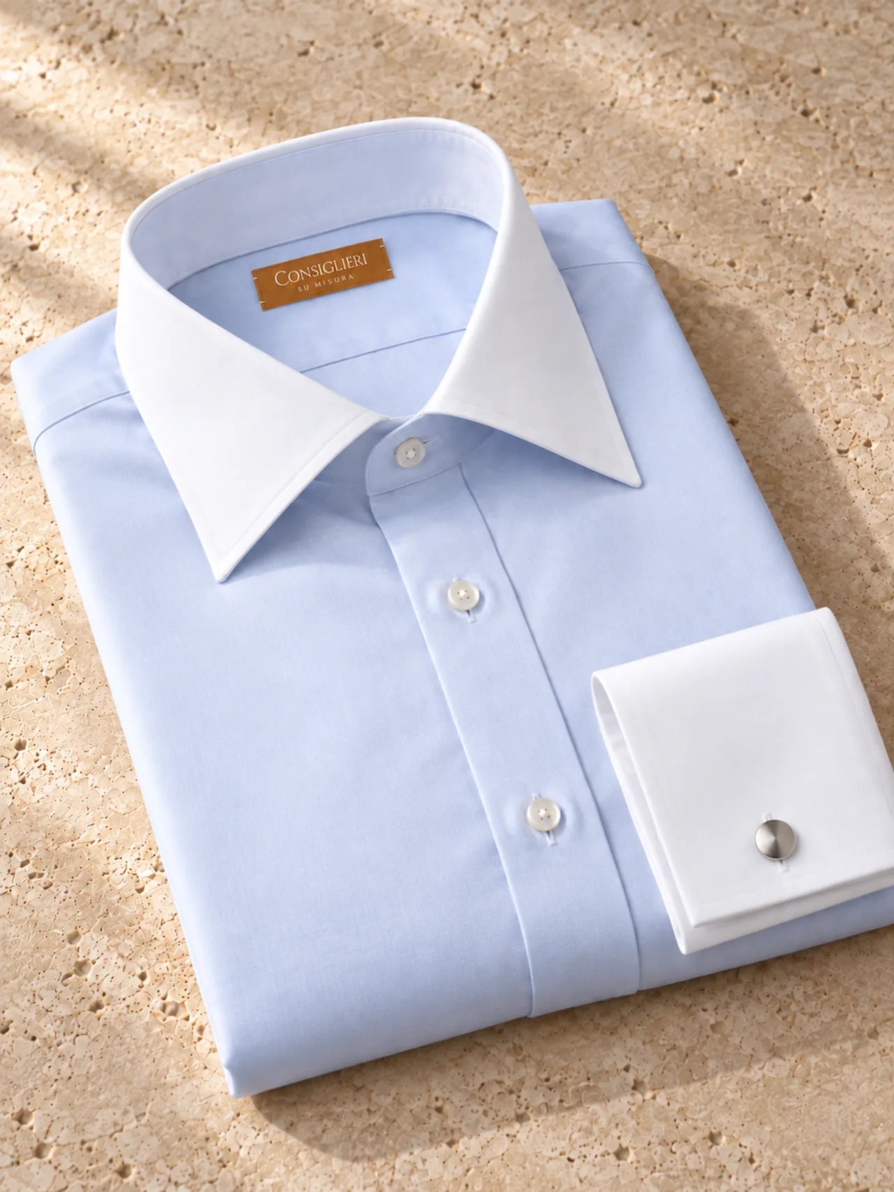 Folded classic contrast shirt, with the collar and cuff in view.